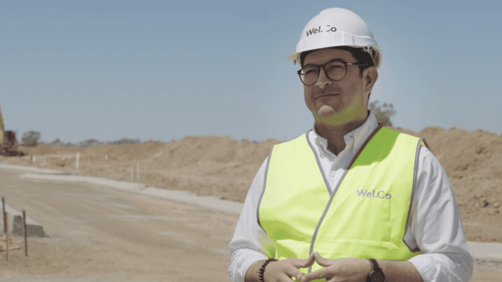 Wel.Co employee in high vis vest at construction site